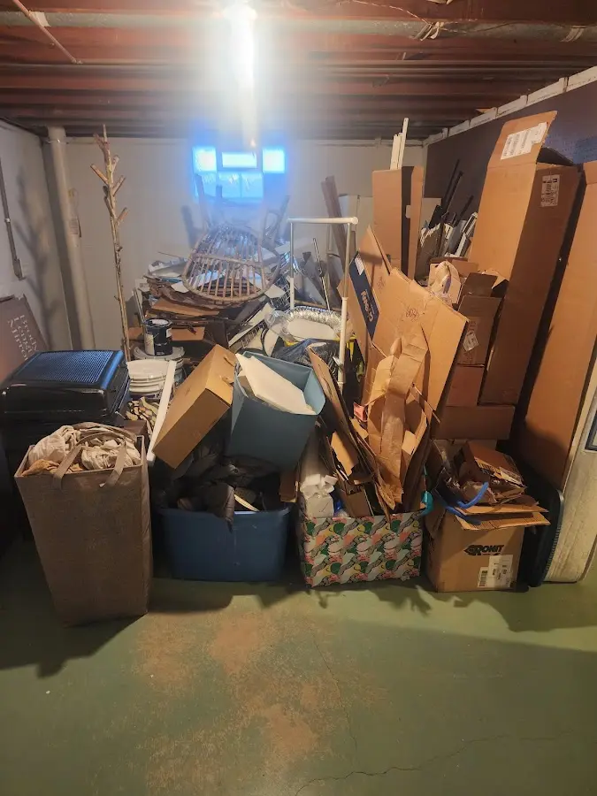 Roll-off dumpster container at job site for 4 Yard Dumpster Rental in Lindsay